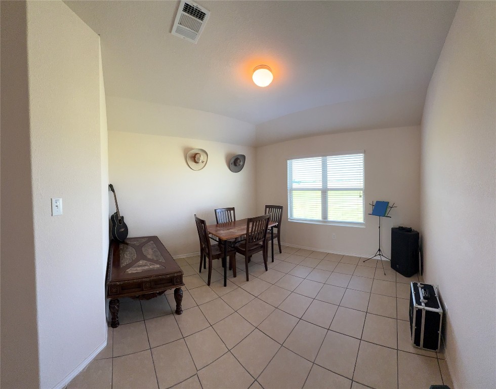 352 Circle Way, Unit 37E Jarrell, TX 76537 - Photo 17 of 39 a living room with furniture and a window