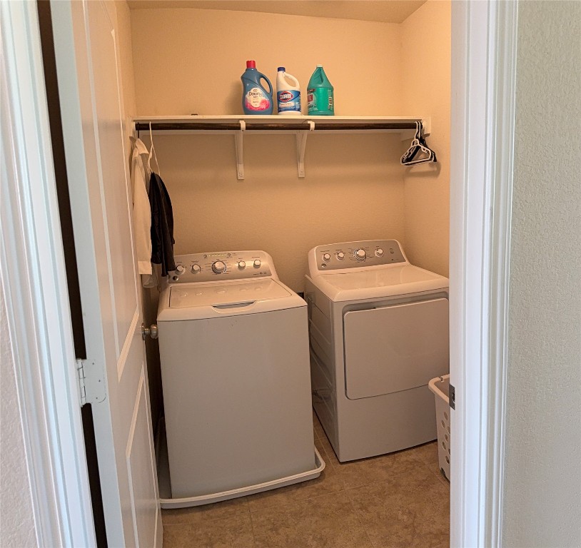 352 Circle Way, Unit 37E Jarrell, TX 76537 - Photo 21 of 39 a utility room with dryer and washer