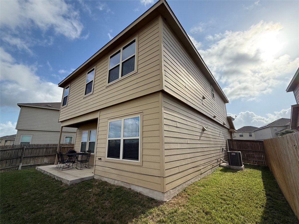 352 Circle Way, Unit 37E Jarrell, TX 76537 - Photo 30 of 39 a view of backyard of house