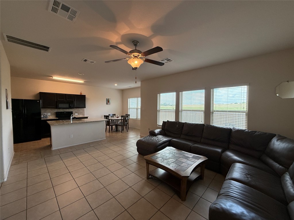 352 Circle Way, Unit 37E Jarrell, TX 76537 - Photo 3 of 39 a living room with furniture