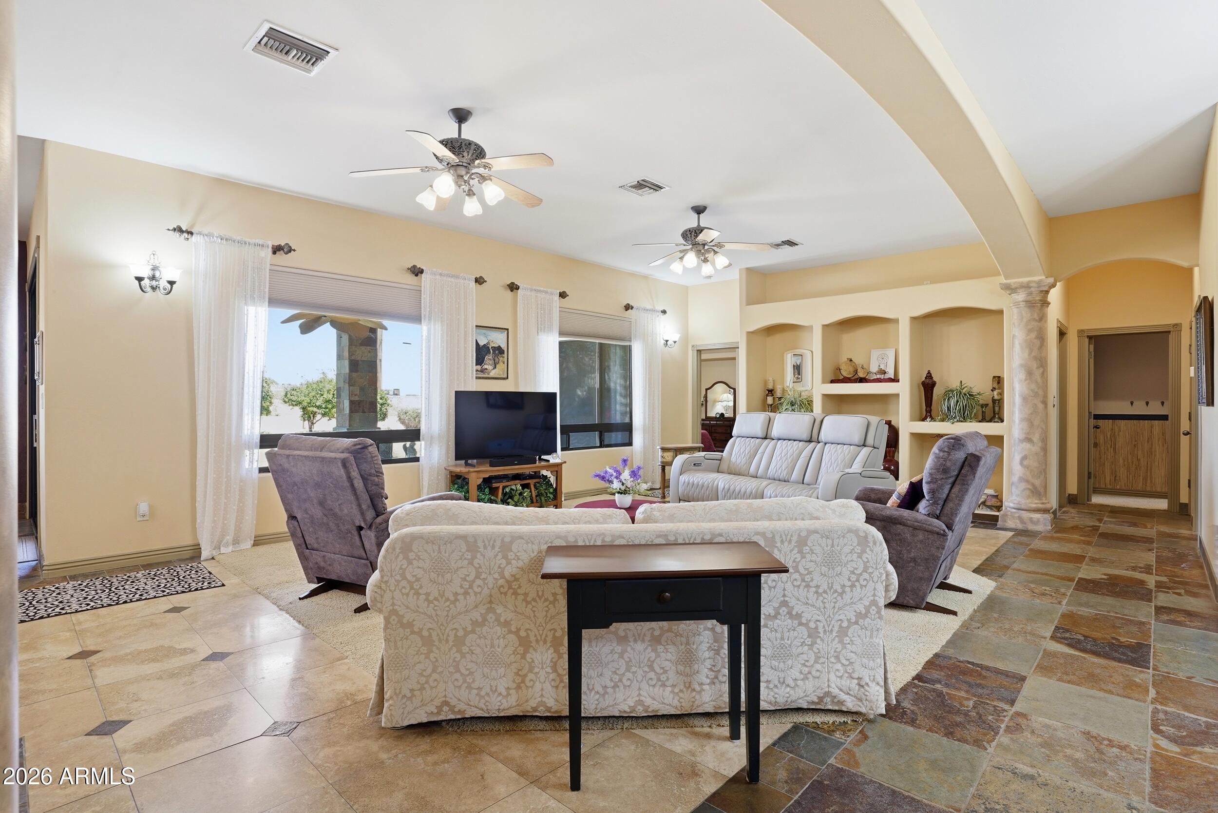 6334 East Albany Street Mesa, AZ 85205 - Photo 16 of 72 a view of a dining room with furniture