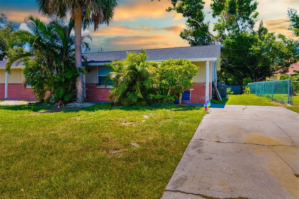 544 Briarwood Road Venice, FL 34293 - Photo 1 of 1 a view of a backyard with garden