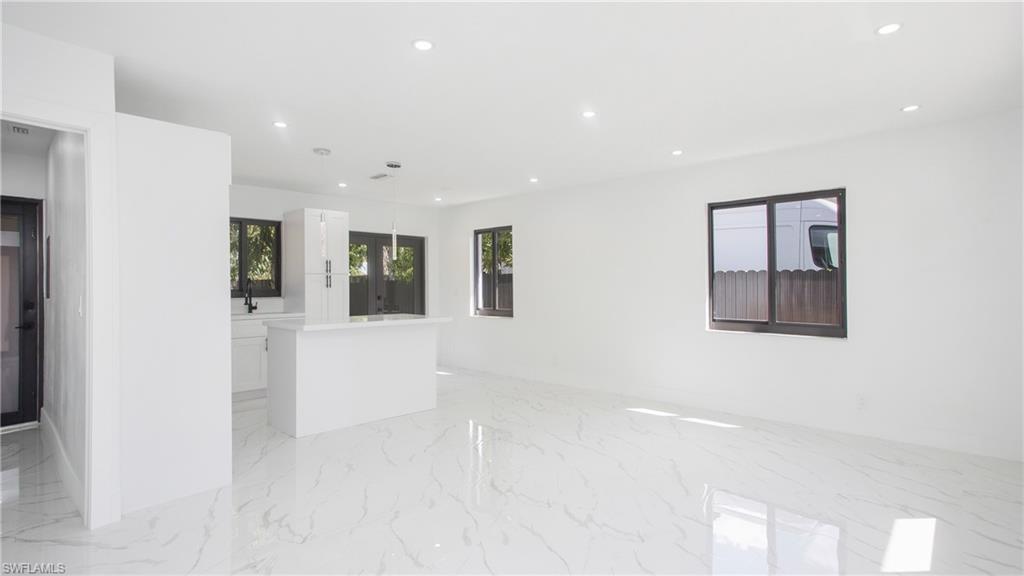 5477 Martin Street Naples, FL 34113 - Photo 9 of 21 a view of an empty room