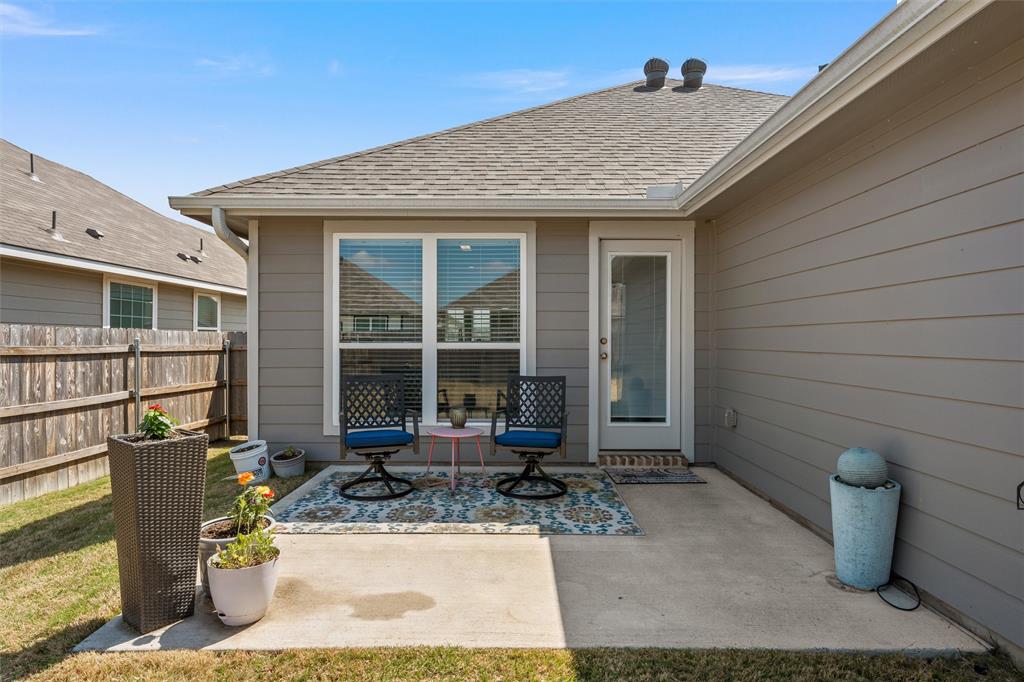 4056 Centerfire Road Waco, TX 76705 - Photo 22 of 27 a front view of a house with sitting area