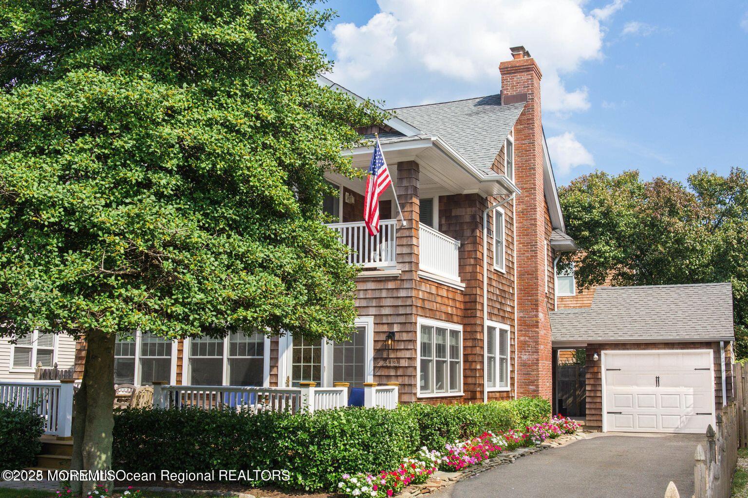 front view of a house with a street