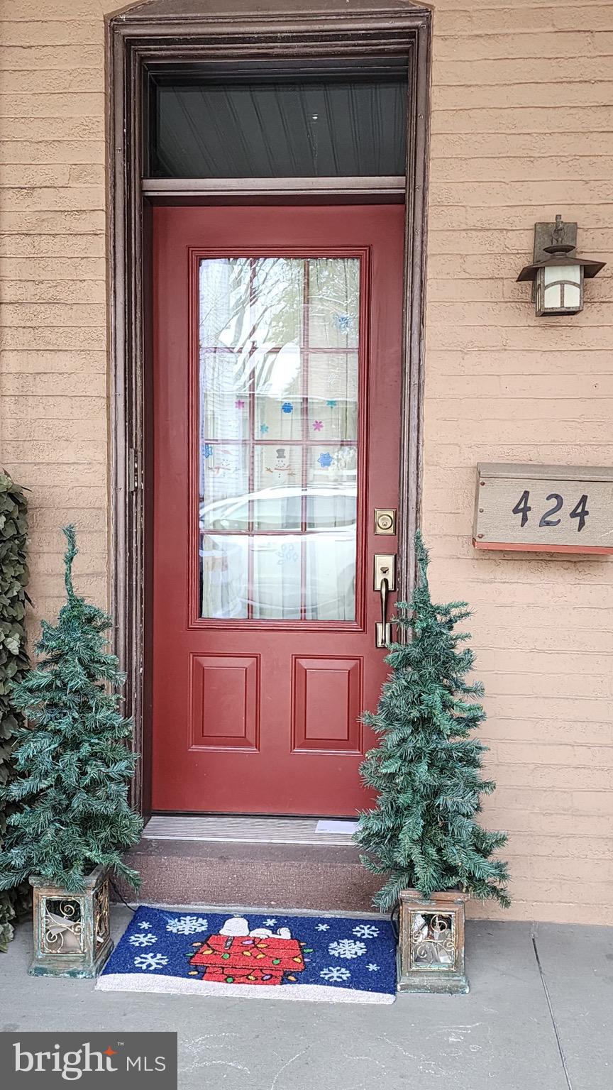 424 Main Street Denver, PA 17517 - Photo 4 of 8 a front view of a house with a yard