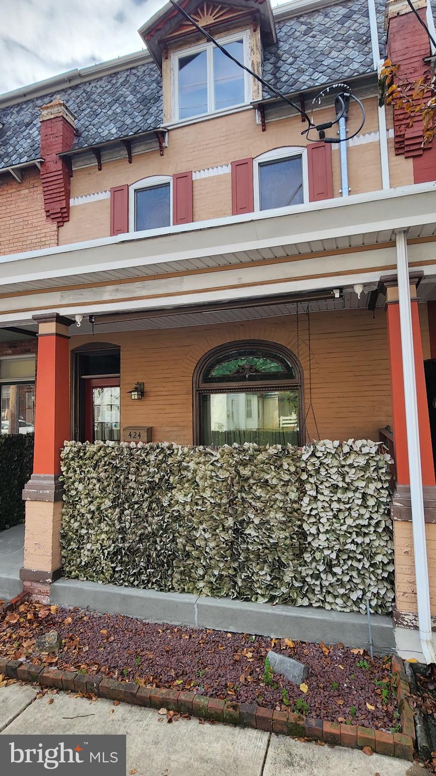 424 Main Street Denver, PA 17517 - Photo 5 of 8 front view of a house