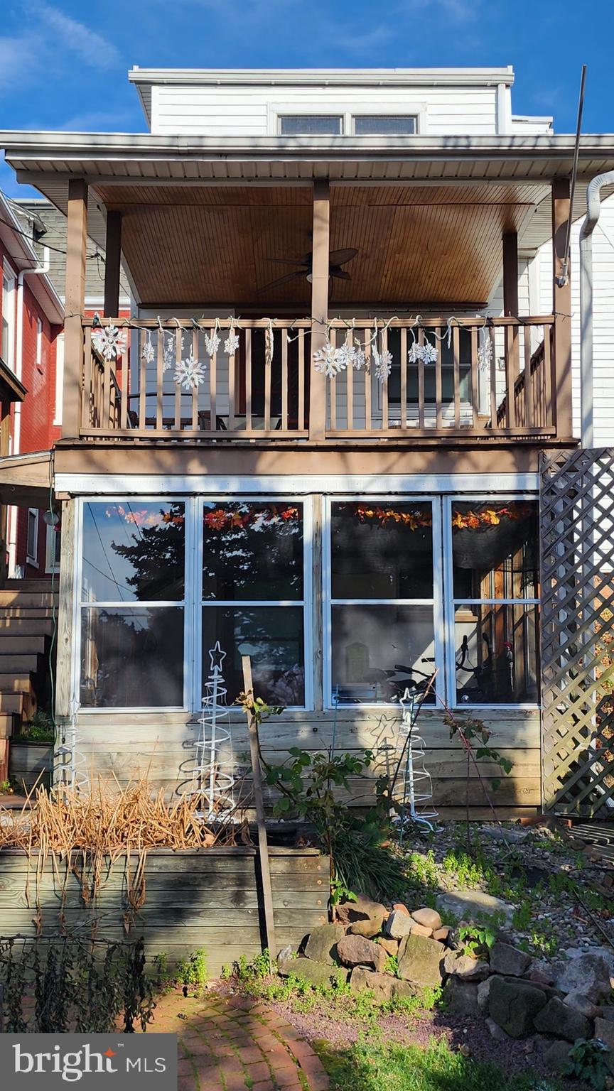 424 Main Street Denver, PA 17517 - Photo 8 of 8 a front view of a house with a yard