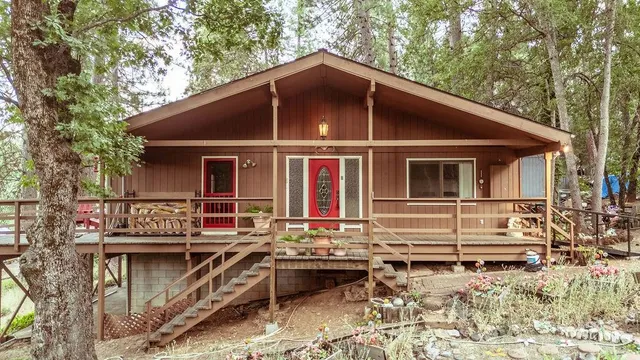 a front view of a house with garage