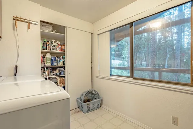 a room with furniture and a window