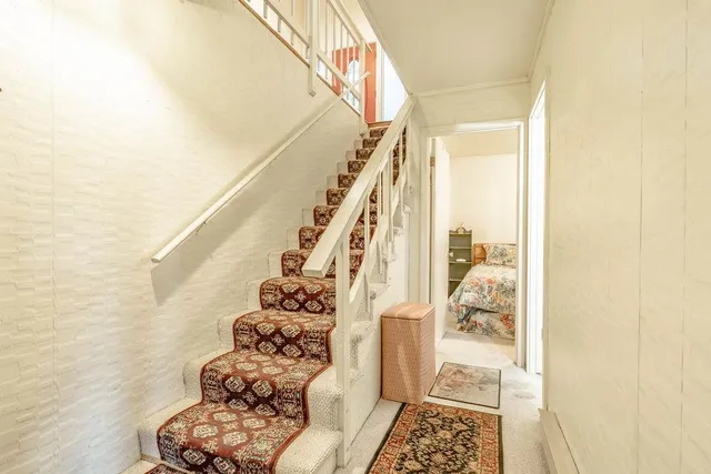 a view of entryway with wooden floor