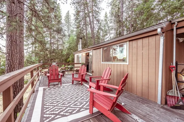 a view of balcony with furniture