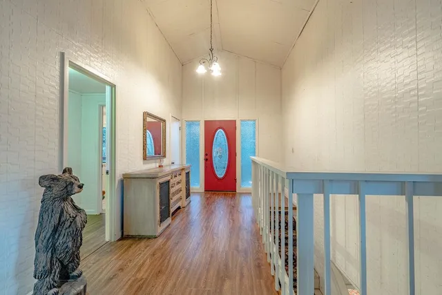 a view of entryway with wooden floor