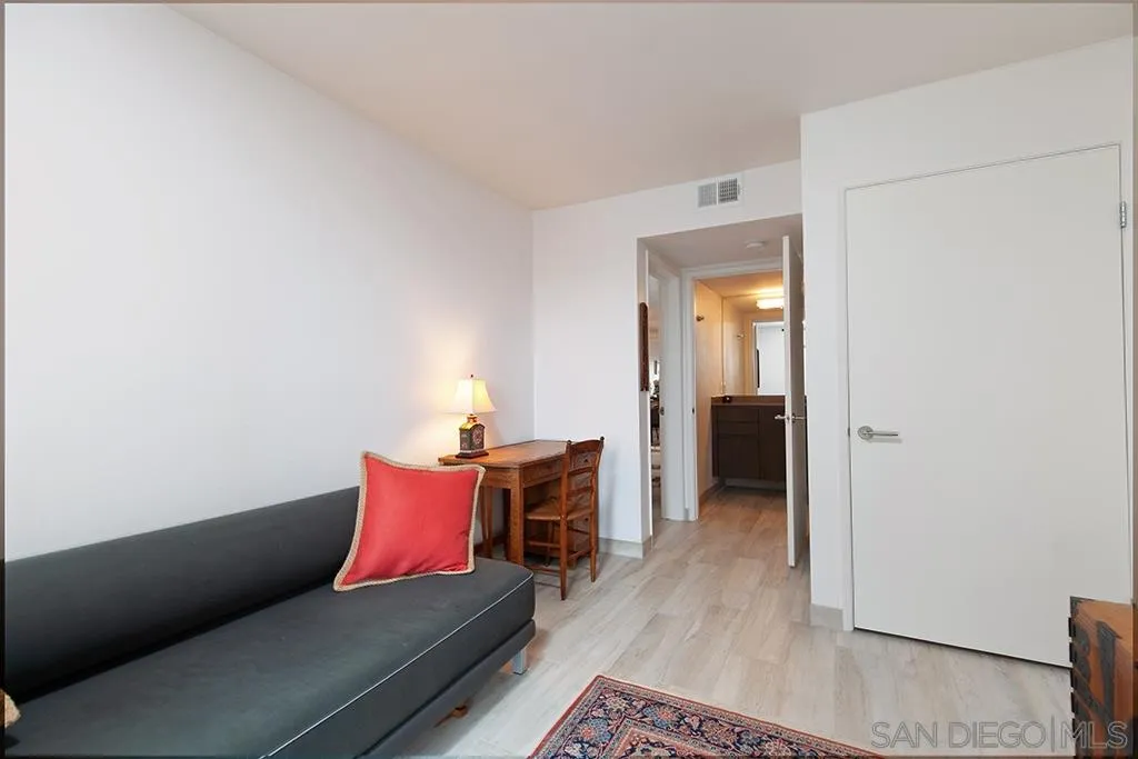 940 Sealane Drive, Unit 3 Encinitas, CA 92024 - Photo 15 of 23 a living room with furniture and a wooden floor
