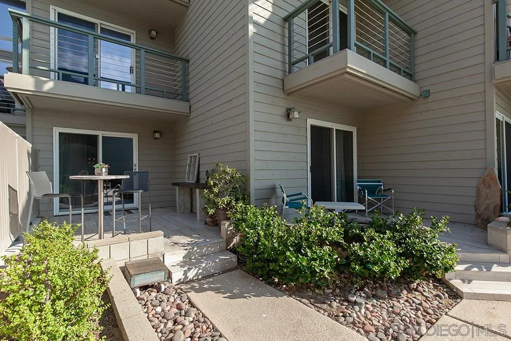 940 Sealane Drive, Unit 3 Encinitas, CA 92024 - Photo 19 of 23 a backyard of a house with outdoor seating and plants