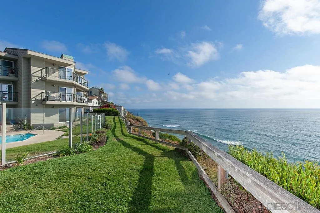 940 Sealane Drive, Unit 3 Encinitas, CA 92024 - Photo 2 of 23 a view of a house with a yard and sitting area