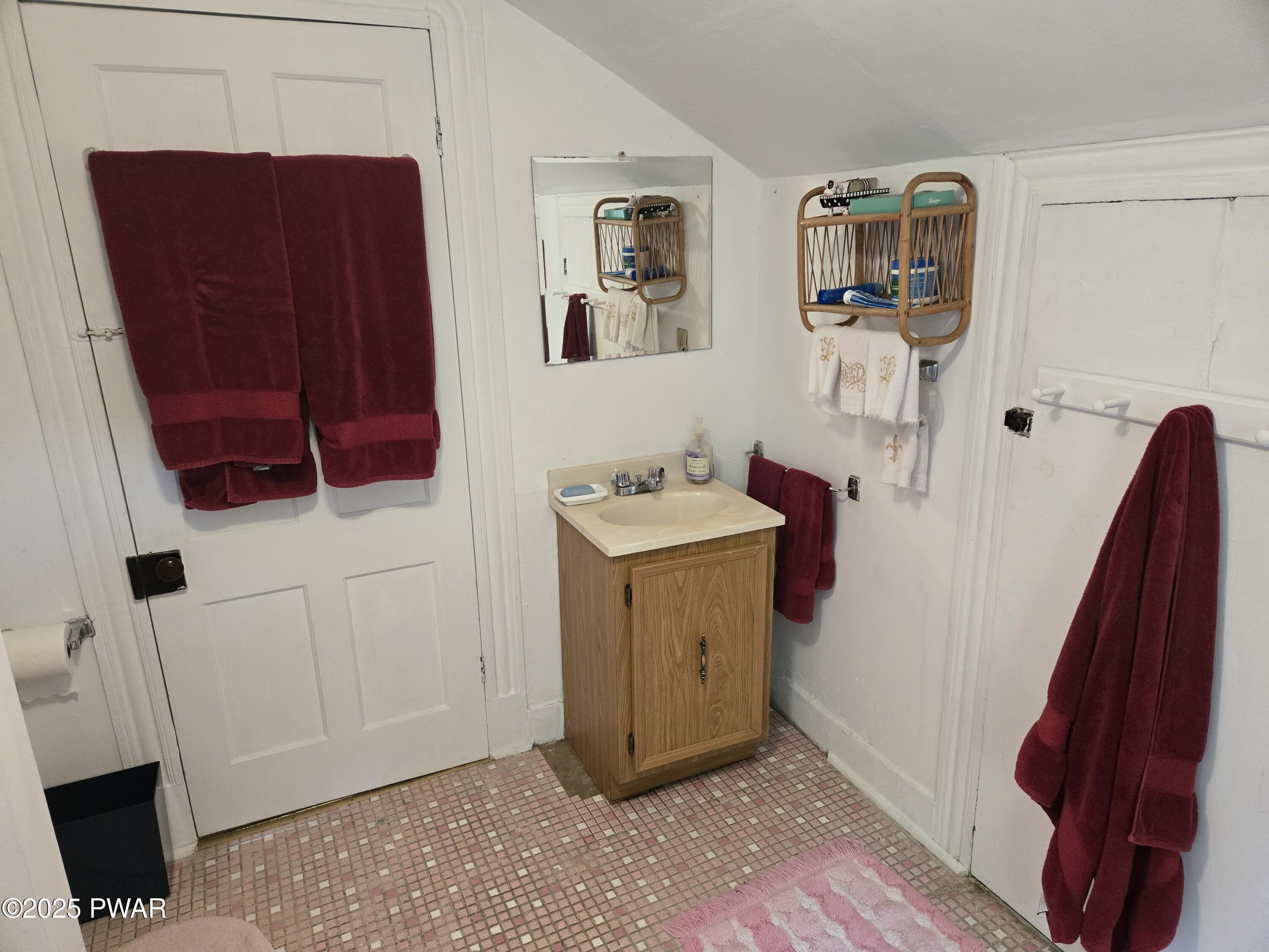 1467 Cortez Road Lake Ariel, PA 18436 - Photo 23 of 36 a view of storage and utility room with two washing machine