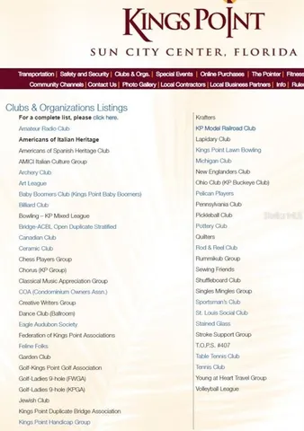 a sign that is sitting in front of flowers