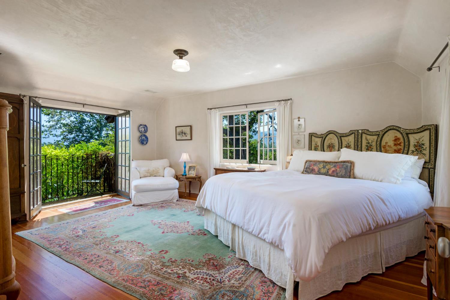 520 Foothill Road Ojai, CA 93023 - Photo 14 of 45 a bedroom with a large bed and a couch