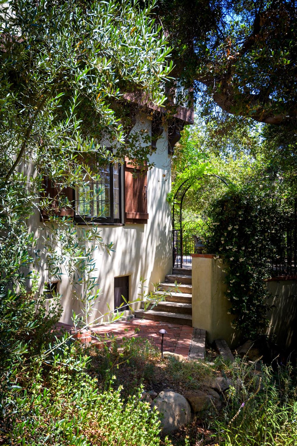 520 Foothill Road Ojai, CA 93023 - Photo 17 of 45 a backyard of a house with lots of green space