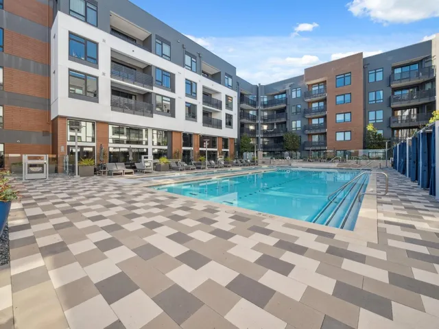 a view of a building with a swimming pool