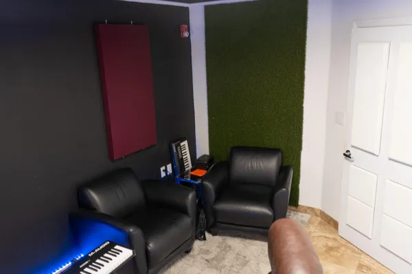 a room with furniture and flat screen tv