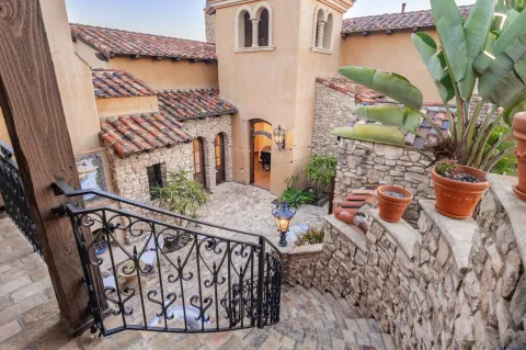 a view of stairs and a garden