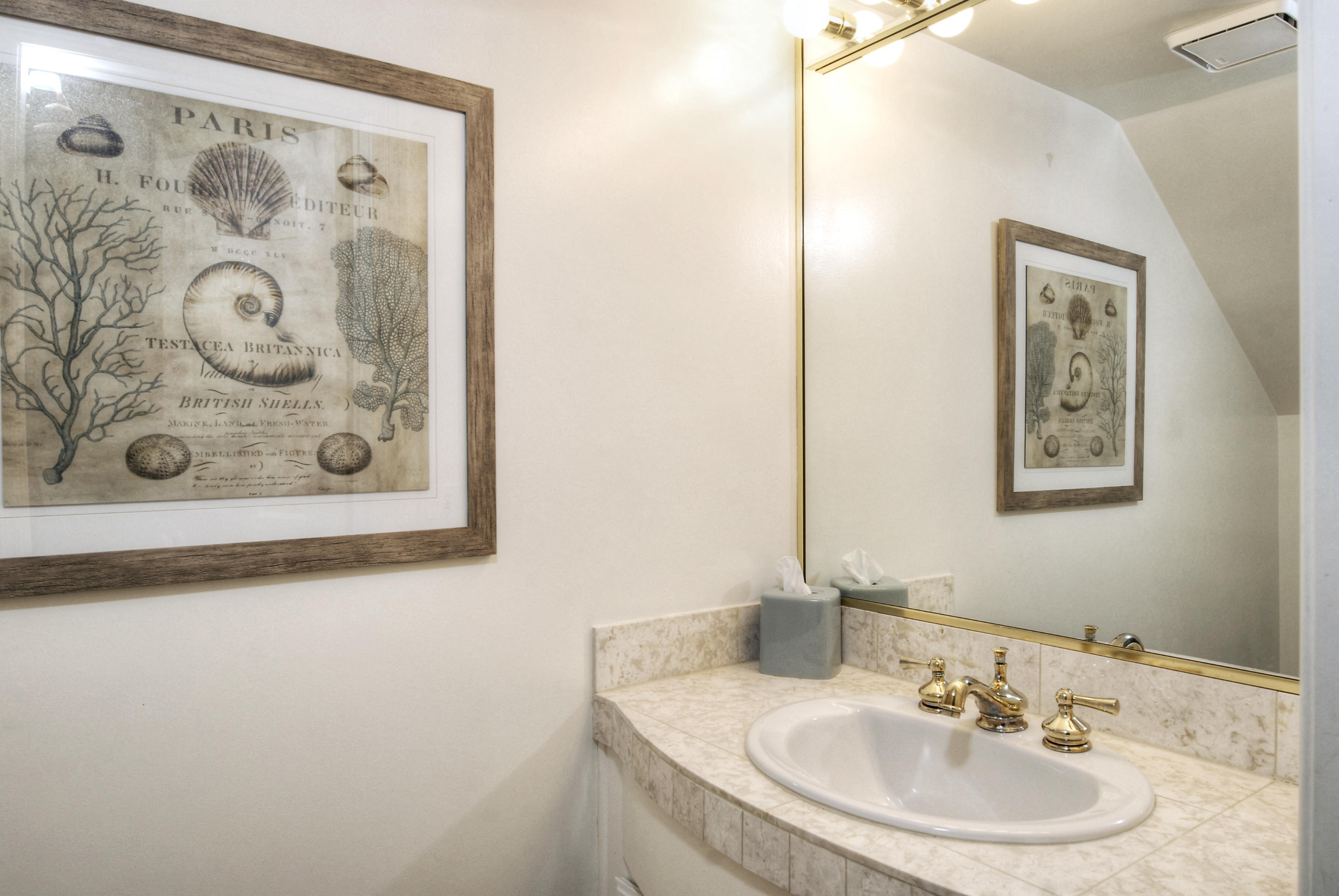 681 Mandalay Beach Road Oxnard, CA 93035 - Photo 14 of 39 a bathroom with a sink and a mirror