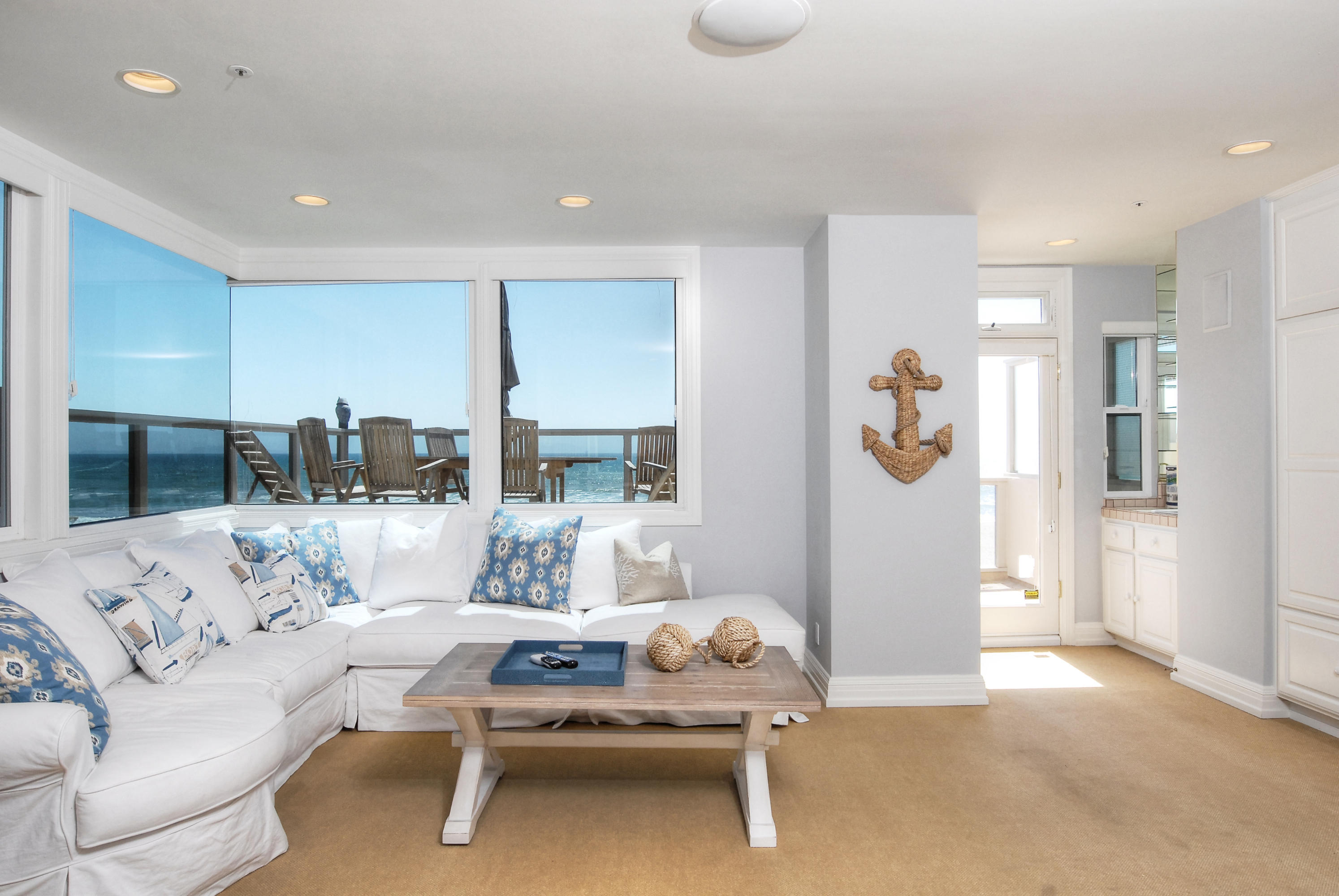 681 Mandalay Beach Road Oxnard, CA 93035 - Photo 18 of 39 a living room with furniture and a table