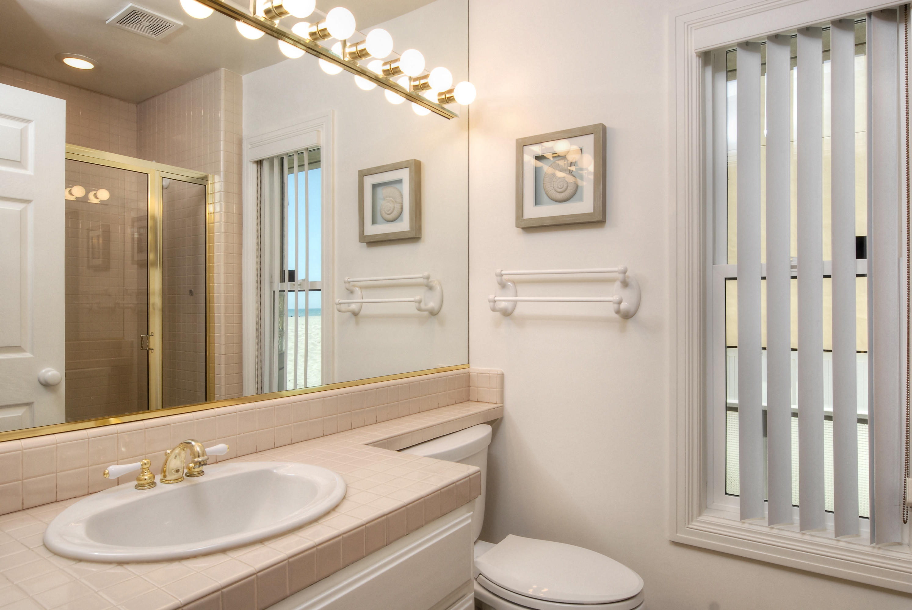 681 Mandalay Beach Road Oxnard, CA 93035 - Photo 31 of 39 a bathroom with a sink toilet and shower