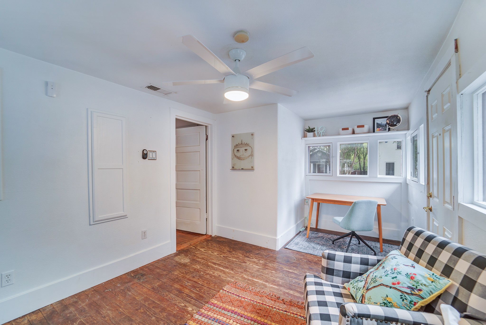 501 West 41st Street Austin, TX 78751 - Photo 18 of 18 a living room with furniture and a window