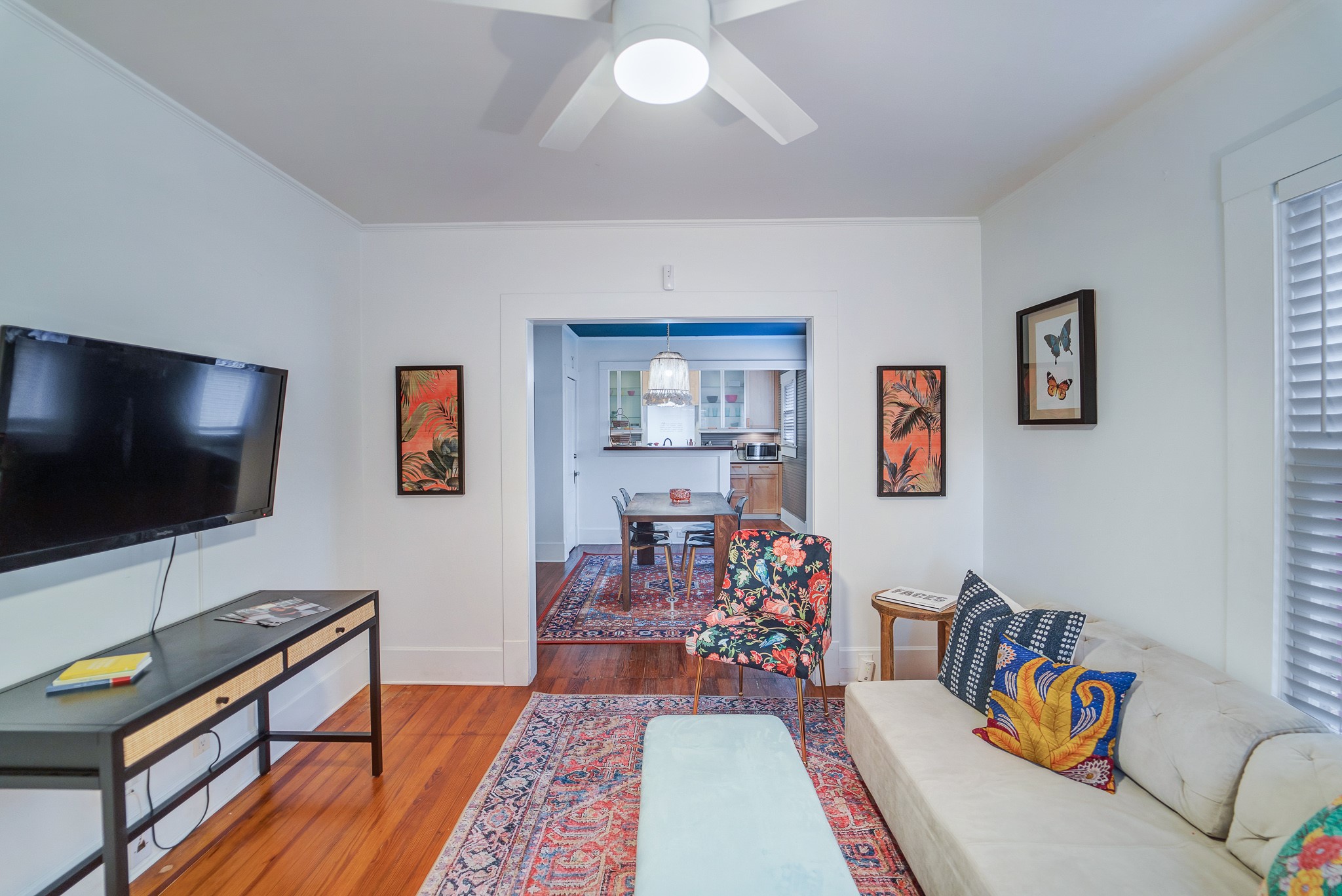 501 West 41st Street Austin, TX 78751 - Photo 3 of 18 a living room with furniture and a flat screen tv