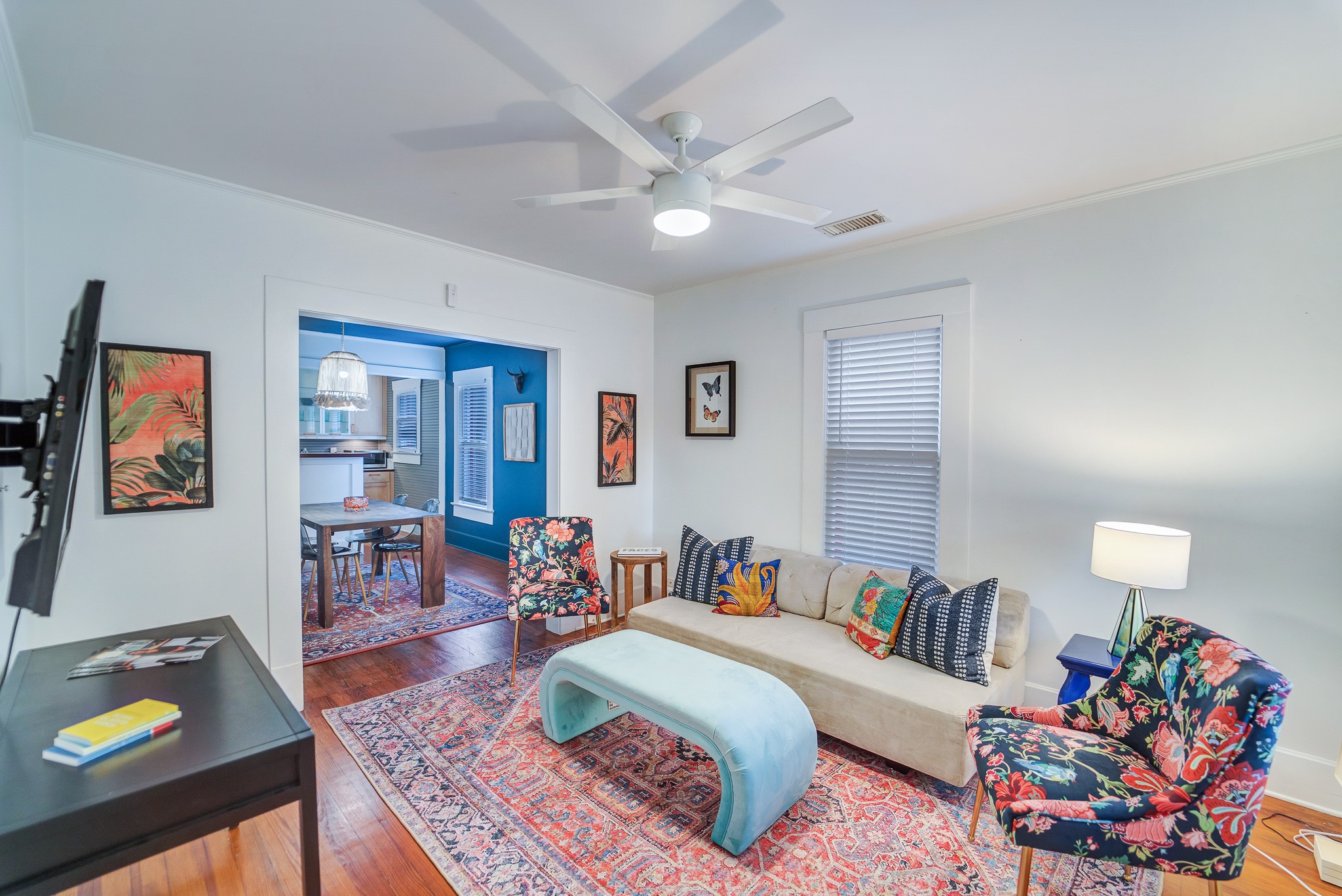 501 West 41st Street Austin, TX 78751 - Photo 4 of 18 a living room with furniture and wooden floor