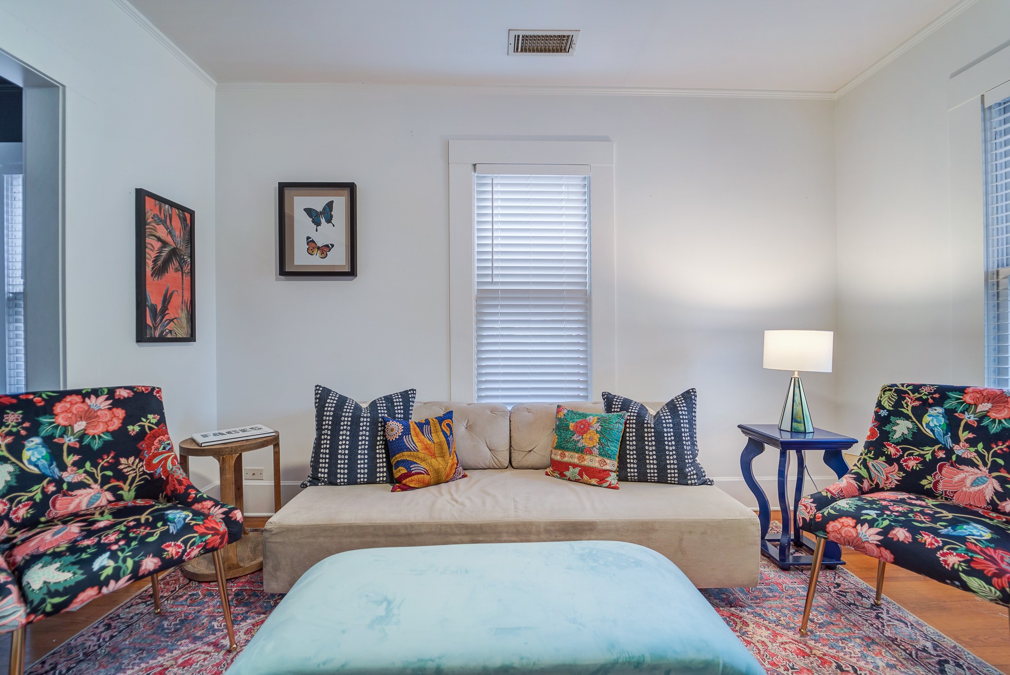 501 West 41st Street Austin, TX 78751 - Photo 5 of 18 a bed room with a bed and a chair