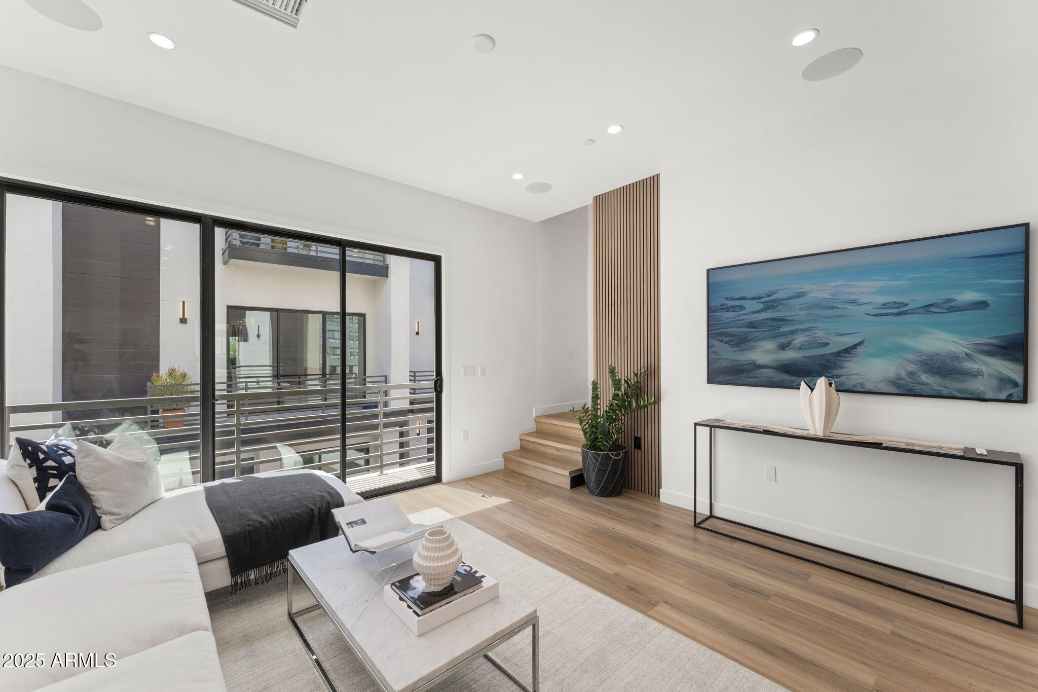 4220 North 32nd Street, Unit 7 Phoenix, AZ 85016 - Photo 15 of 35 a living room with furniture and floor to ceiling window