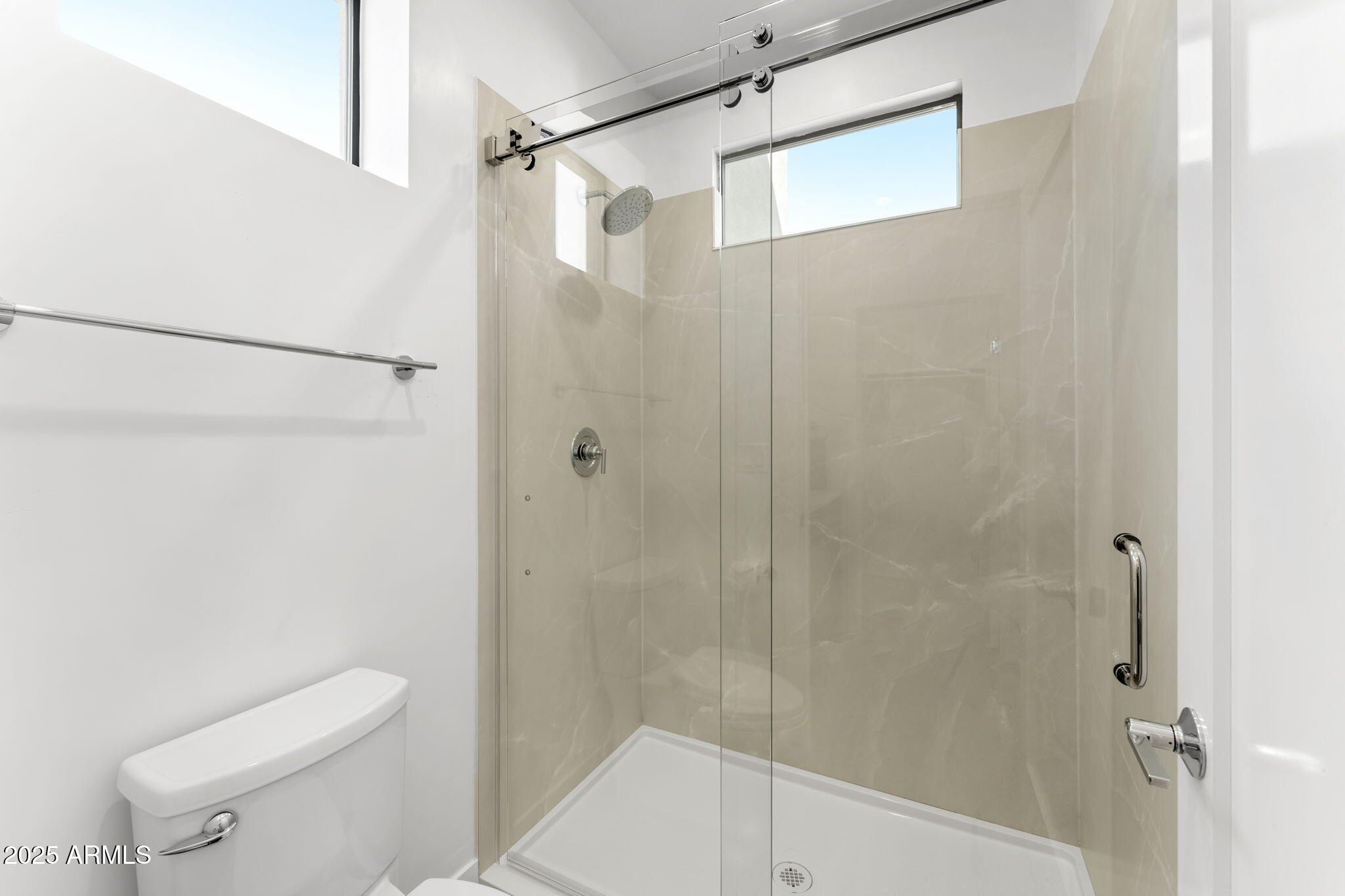 4220 North 32nd Street, Unit 7 Phoenix, AZ 85016 - Photo 20 of 35 a bathroom with a shower and a toilet