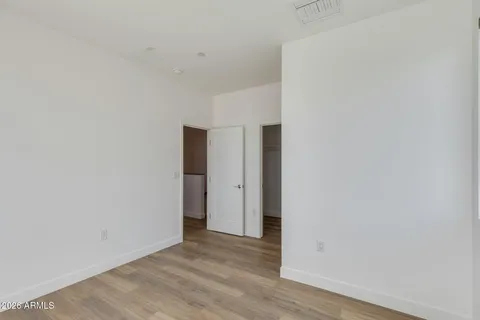 a view of a room with racks on the wall