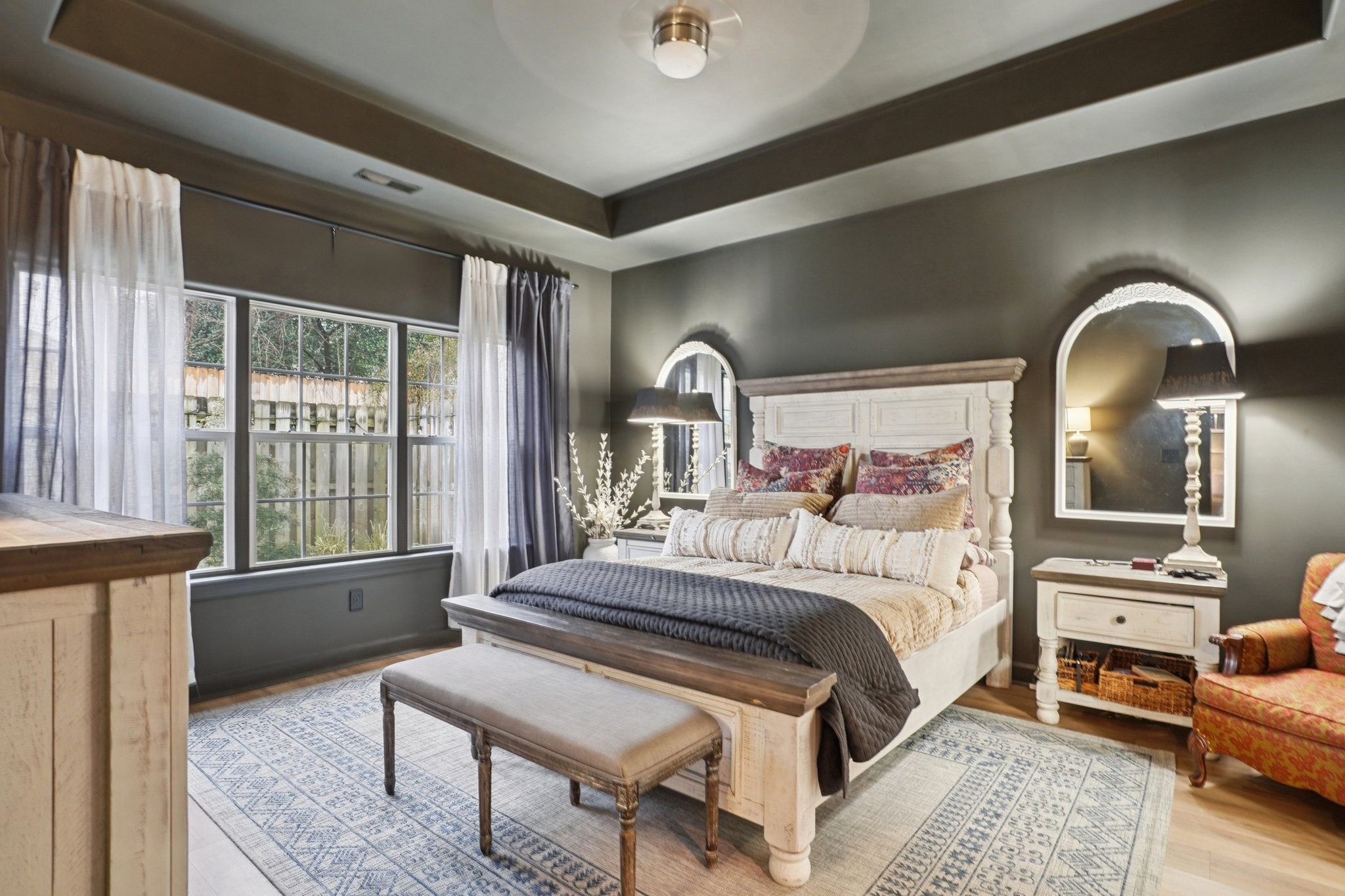 2521 Pennington Bend Road, Unit 206 Nashville, TN 37214 - Photo 17 of 34 a bedroom with a bed and wooden floor