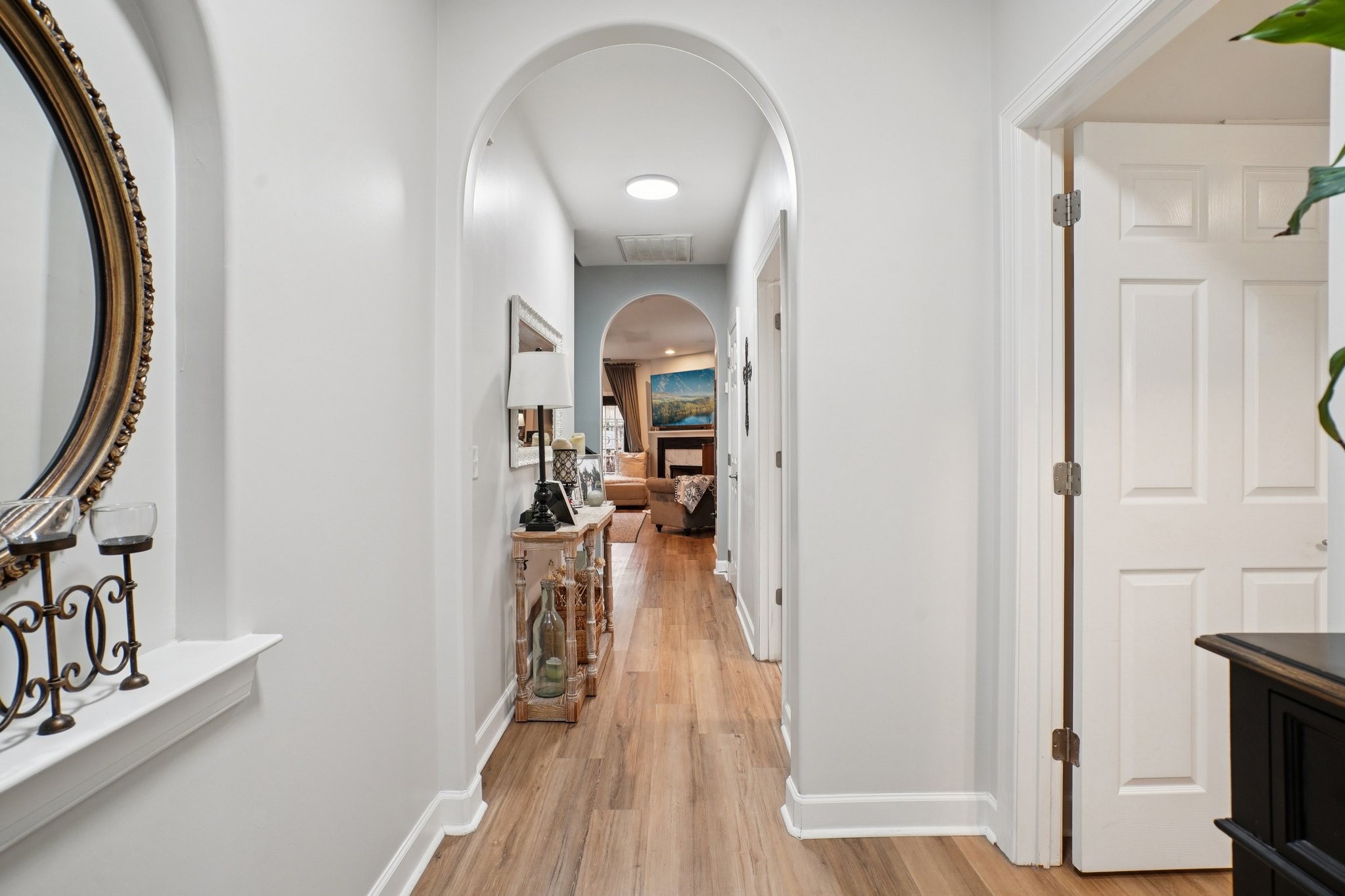 2521 Pennington Bend Road, Unit 206 Nashville, TN 37214 - Photo 2 of 34 a view of a hallway with wooden floor and staircase