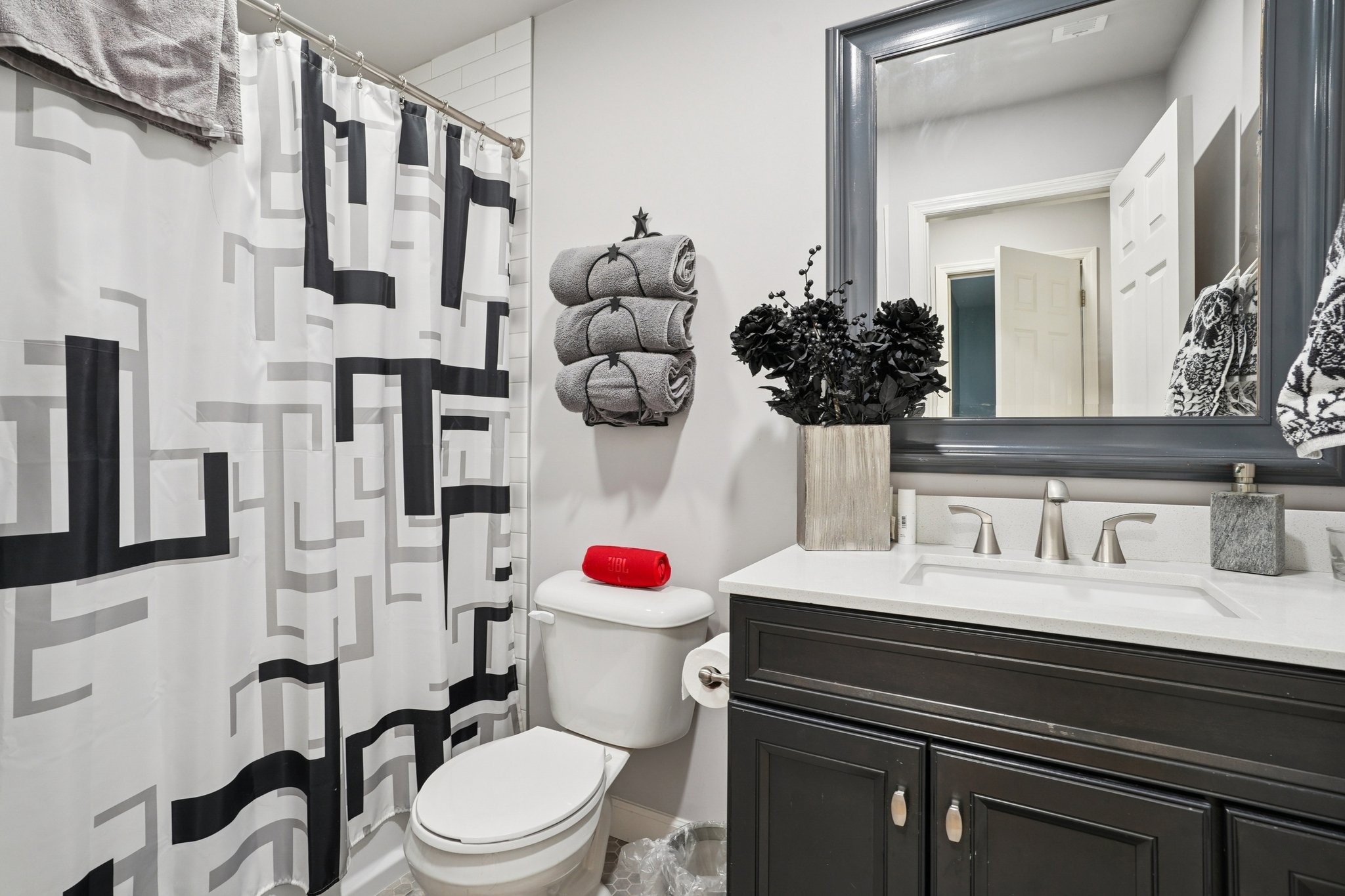 2521 Pennington Bend Road, Unit 206 Nashville, TN 37214 - Photo 26 of 34 a bathroom with a sink vanity mirror and toilet
