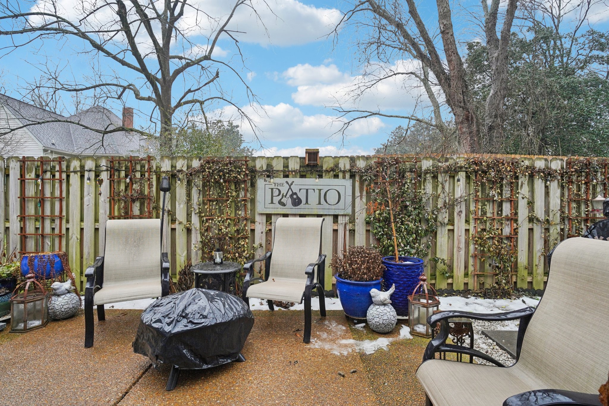 2521 Pennington Bend Road, Unit 206 Nashville, TN 37214 - Photo 28 of 34 a building outdoor space with patio furniture and potted plants