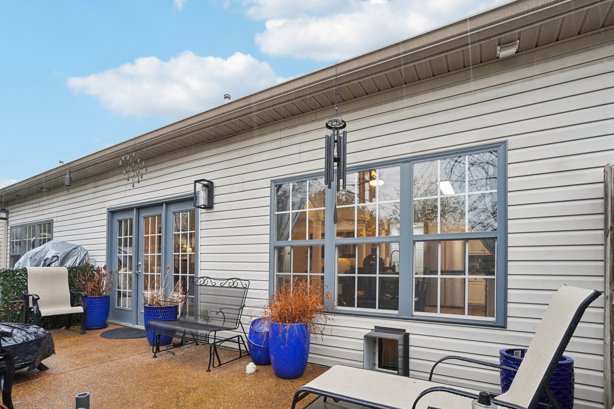 2521 Pennington Bend Road, Unit 206 Nashville, TN 37214 - Photo 30 of 34 a balcony with furniture and potted plants