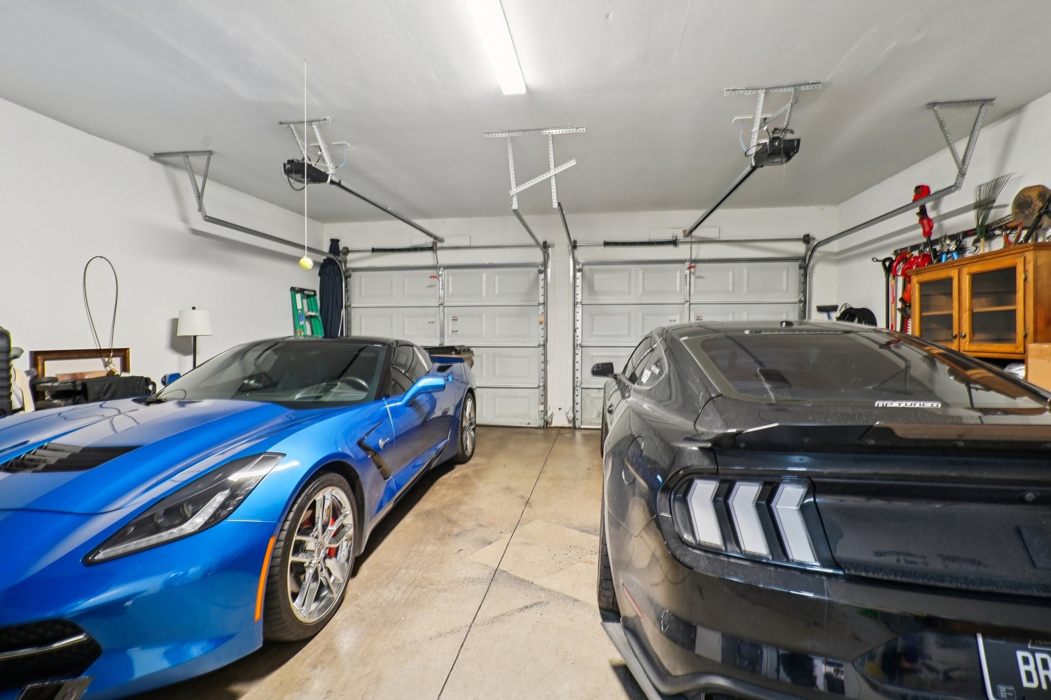 2521 Pennington Bend Road, Unit 206 Nashville, TN 37214 - Photo 31 of 34 a car and bike parked in a garage
