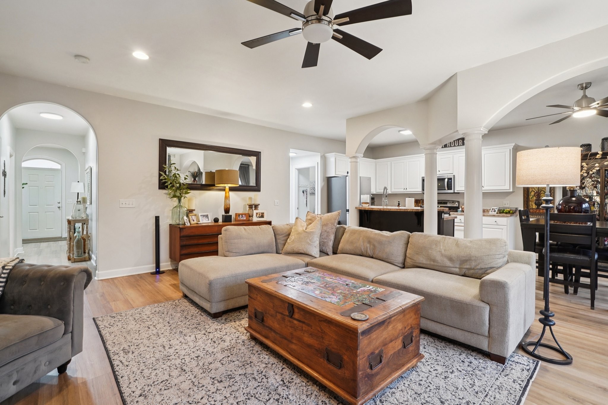 2521 Pennington Bend Road, Unit 206 Nashville, TN 37214 - Photo 7 of 34 a living room with furniture and kitchen view