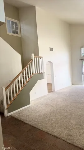a view of balcony with wooden floor