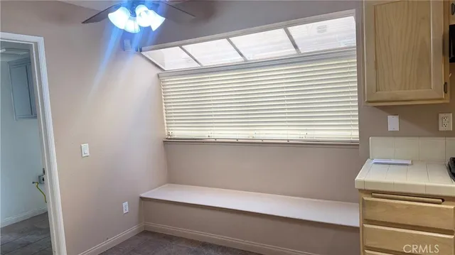 a view of bathroom with a window