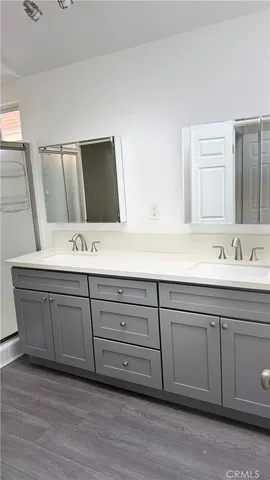 a sink with a mirror
