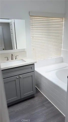 a bathroom with a sink and a bathtub
