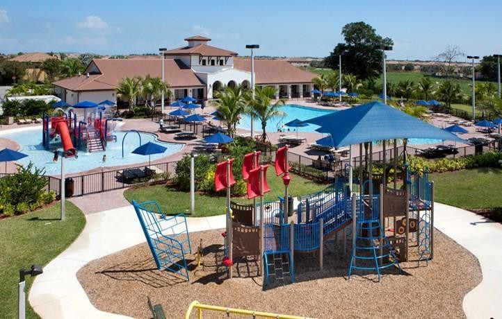 23952 Southwest 117 Place Homestead, FL 33032 - Photo 15 of 16 Silver Palms club house pool and tot lot