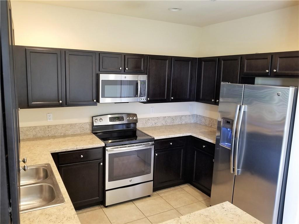 23952 Southwest 117 Place Homestead, FL 33032 - Photo 5 of 16 Kitchen with stainless steel appliances